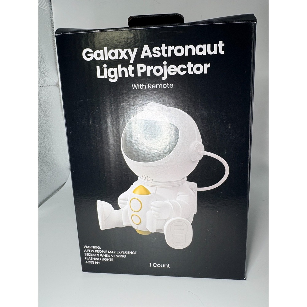 “Astronaut Star Projector 360° Galaxy Night Light with Remote & 8 Modes”